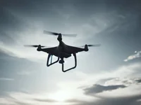 Дрон над закатными облаками