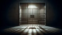 Тюремная решётка в тенях