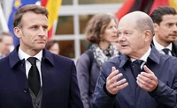 Макрон и Шольц беседуют